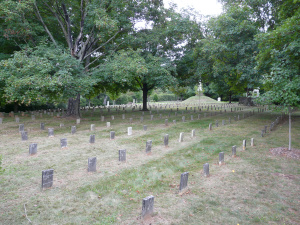 THE BATTLEFIELD: A cemetery farm church for men. Here in Virginia, I saw cartons – I mean, carloads – of little children brought to these war memorials and given a glimpse at an unimaginable adult world. Divested of politics and moral, the battlefields themselves simply say, this is what we do to one another: Here are the holes in the bodies, here are the holes in the earth.